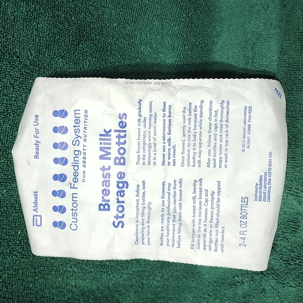 2  new 4 fluid Oz breast milk bottles in sealed package